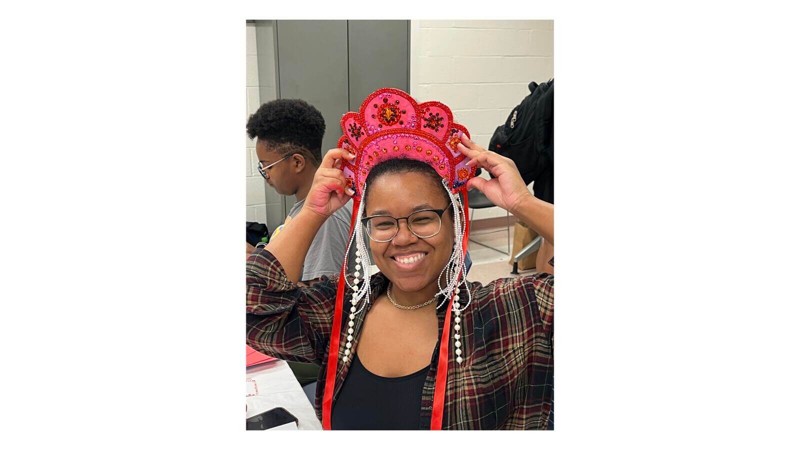 Sydney Thornton, ’26, wearing the kokoshnik (traditional Russian headdress) she made at the DWLC International Festival in April 2025.