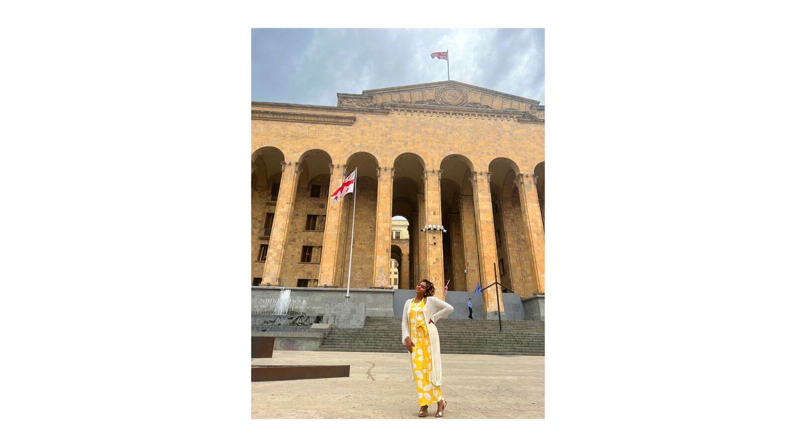 Derah Carter, ’24, in front of the Georgian Parliament building in Tbilisi.